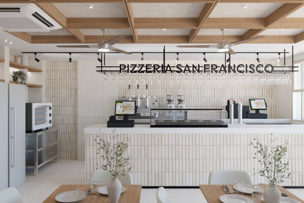 Barra de Pizzería San Francisco, con cerámica clara, madera y detalles negros